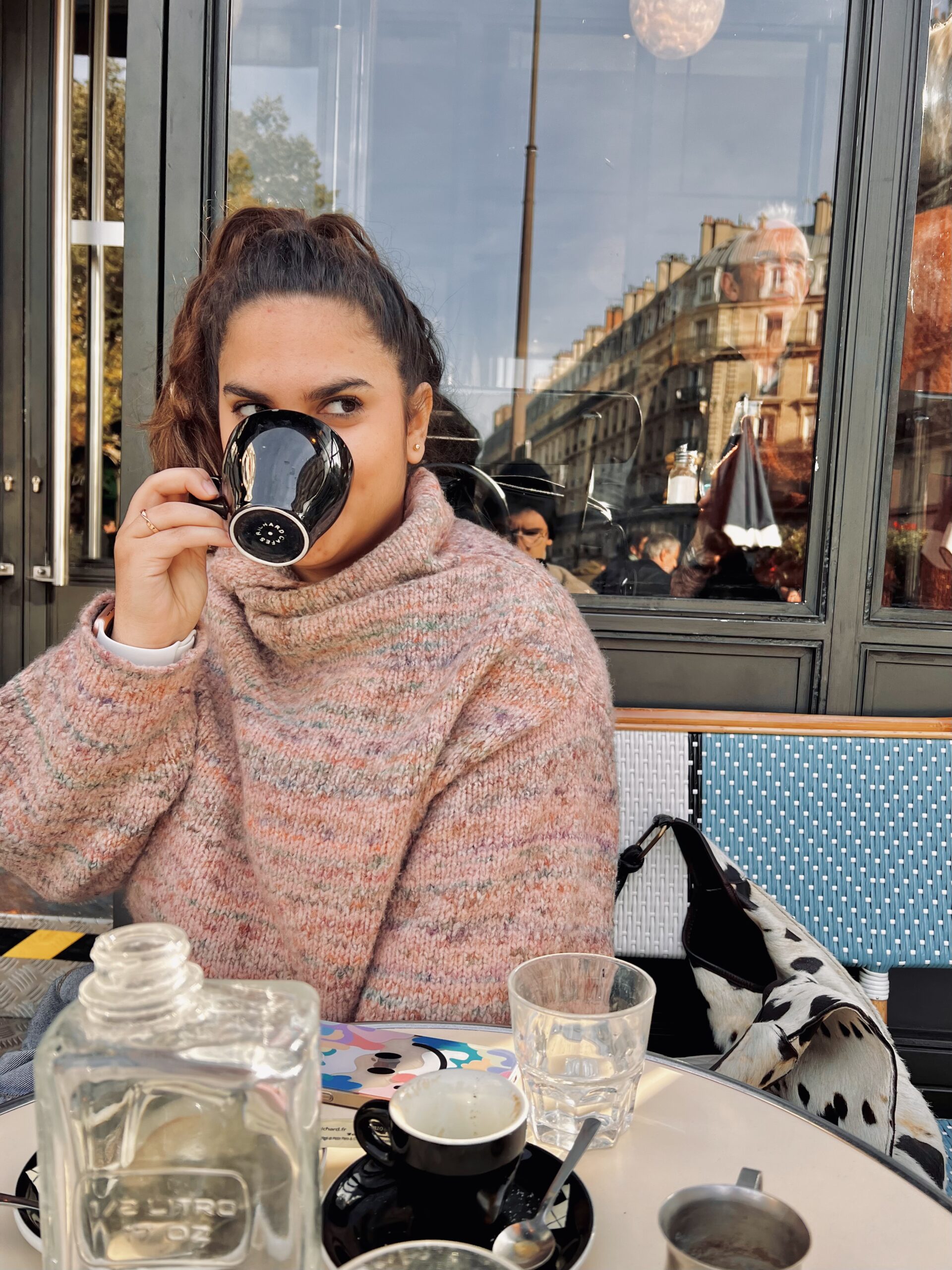 Cecilia drinking coffee